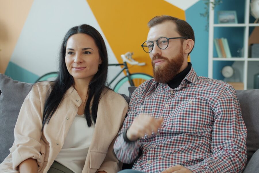 Couple sitting sofa