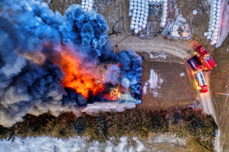 Burning building firefighters