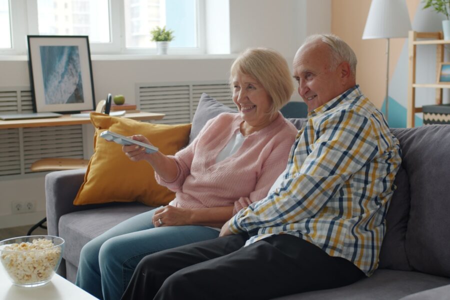 Couple watching sofa