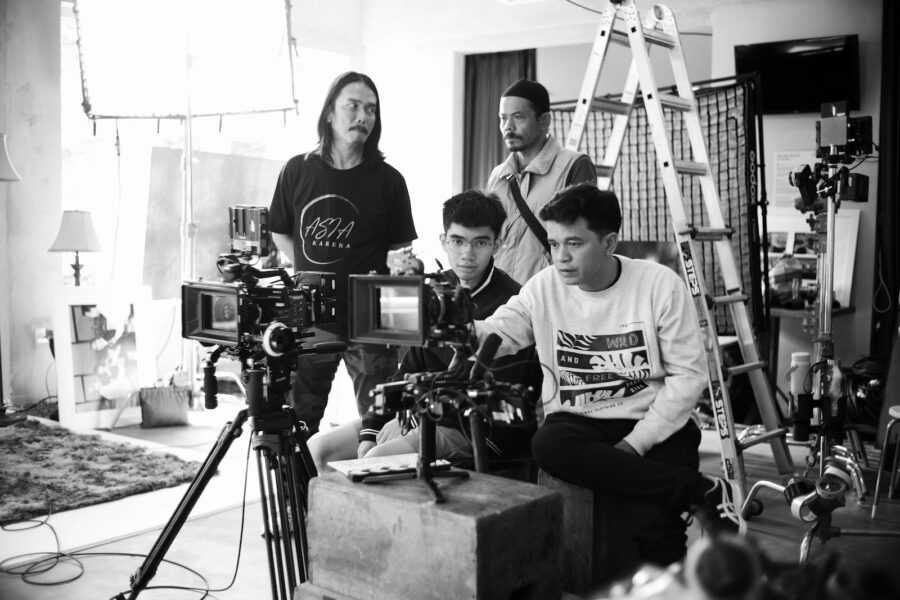 Comedian film set